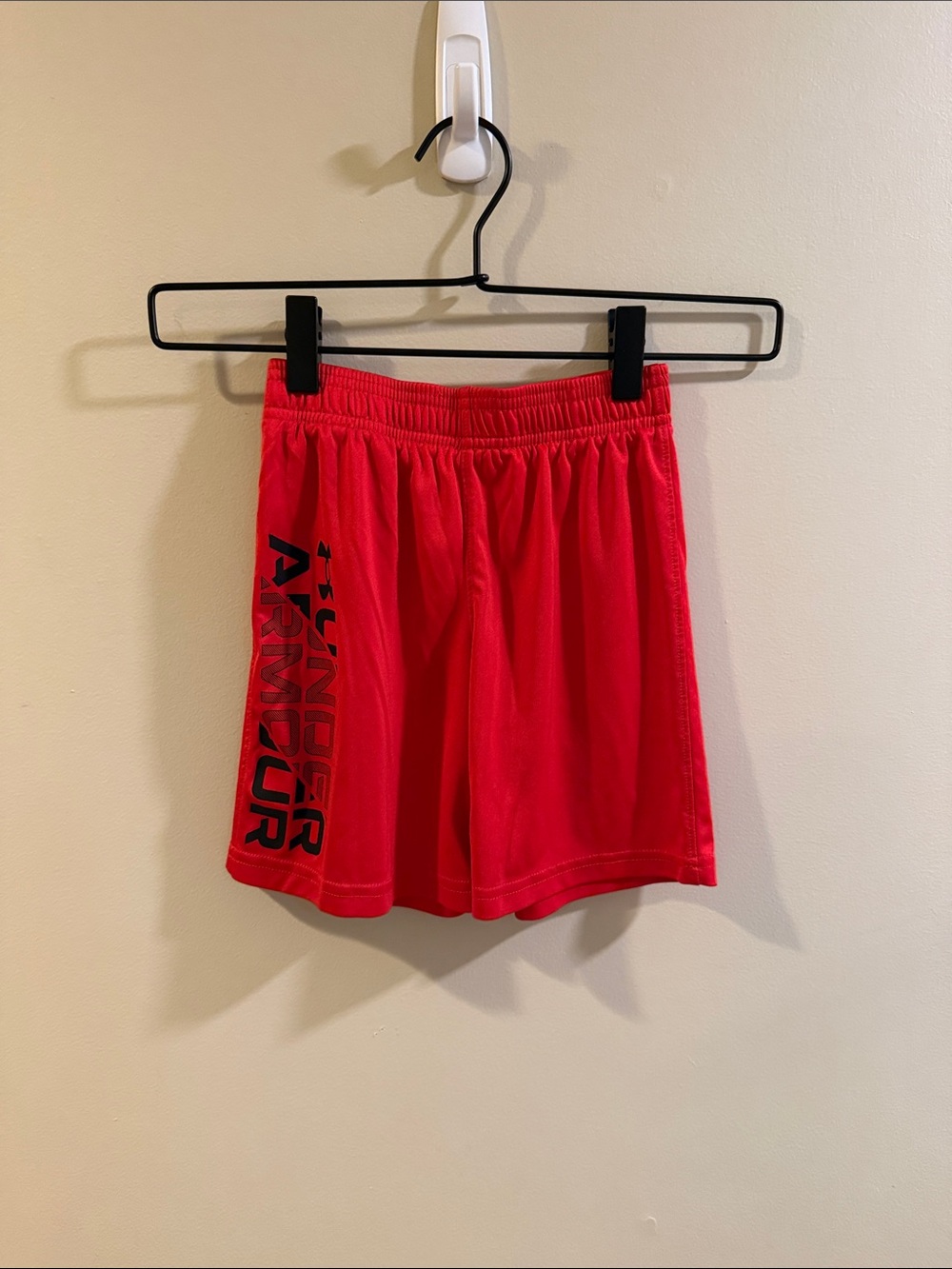 Under Armour Kids Bright Red Athletic Shorts with Black Logo
